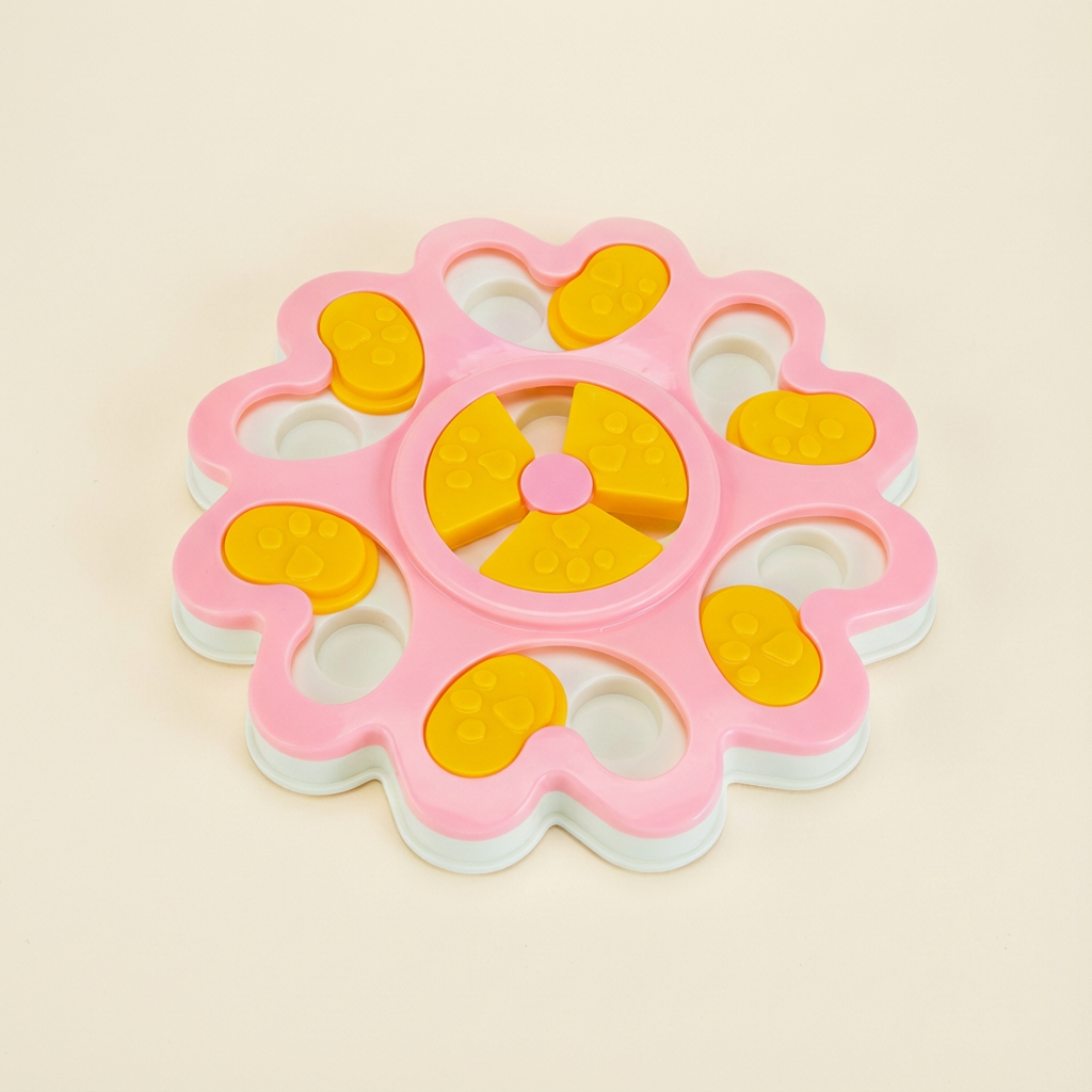 Pawmimi Puzzle Feeder Toy in Pastel Pink shown in a minimal studio shot.